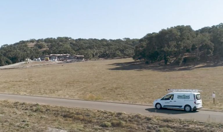 A surfnet van driving down a road